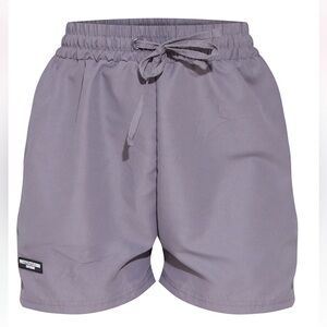 PRETTYLITTLETHING Grey Rubber Badge Peach Skin
Runner Shorts